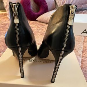 BCBG Size 11 black pumps with zipper